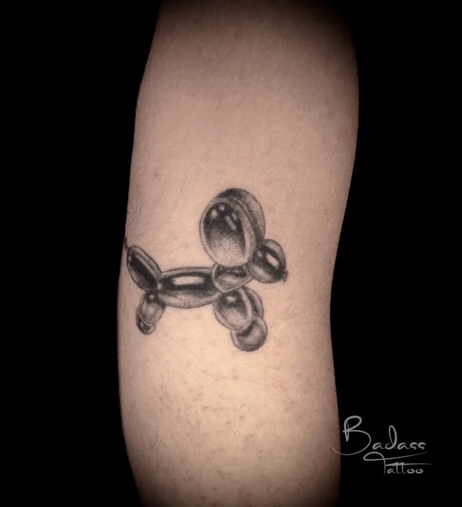Tatuaj realizat de Cătălina — Cățel din baloane black and grey
